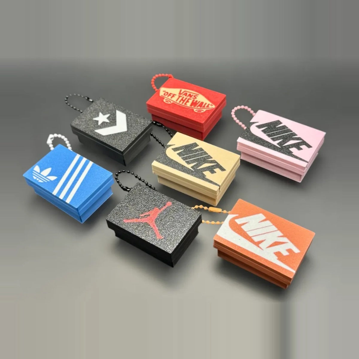 Los 7 modelos de llavero clicker mini caja de zapatillas