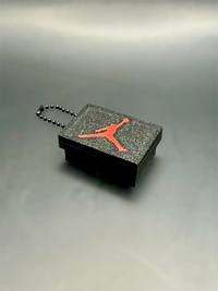 Llavero clicker caja de zapatillas negro